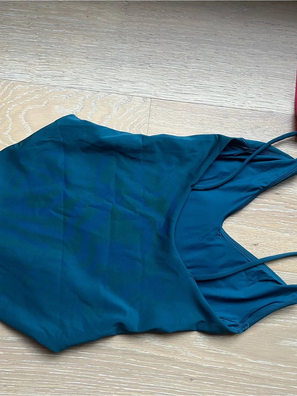 Left On Friday sleek teal